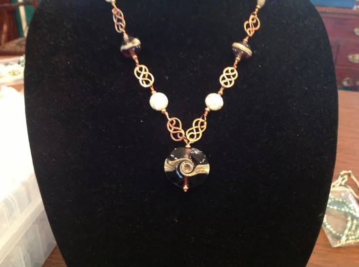 Celtic Purple Swirl Necklace, original archive photograph of handmade glasswork by Ann Wierbinski